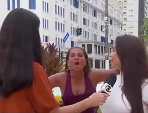 Mulher surge em transmissão ao vivo e grita “Globo lixo”