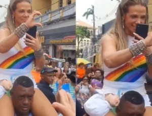 Carla Perez pede desculpas após subir em ombros de segurança negro